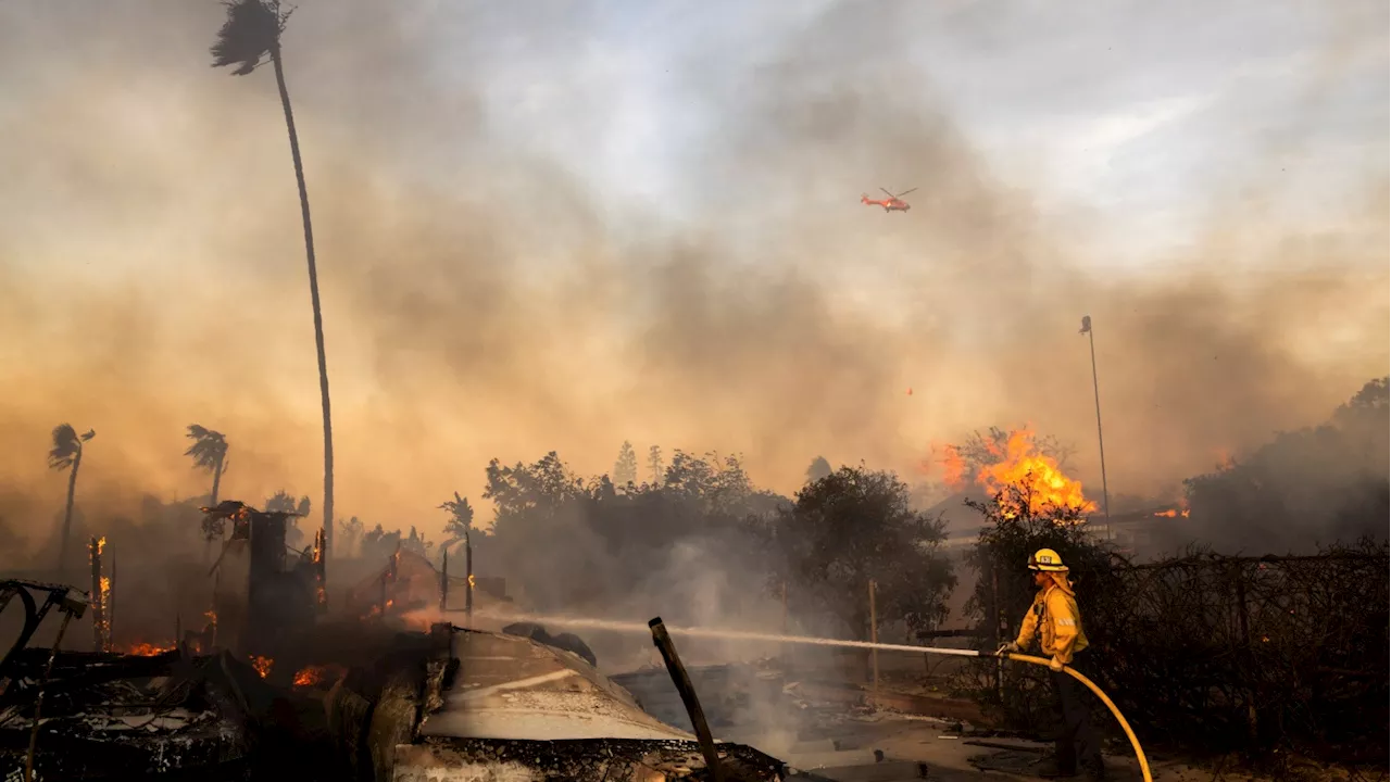 Slower winds aid firefighters battling destructive blaze in Southern California