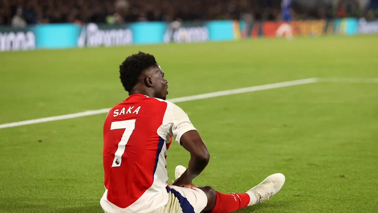 Bukayo Saka hobbles off after being clattered into in worrying moment for Arsenal and England...