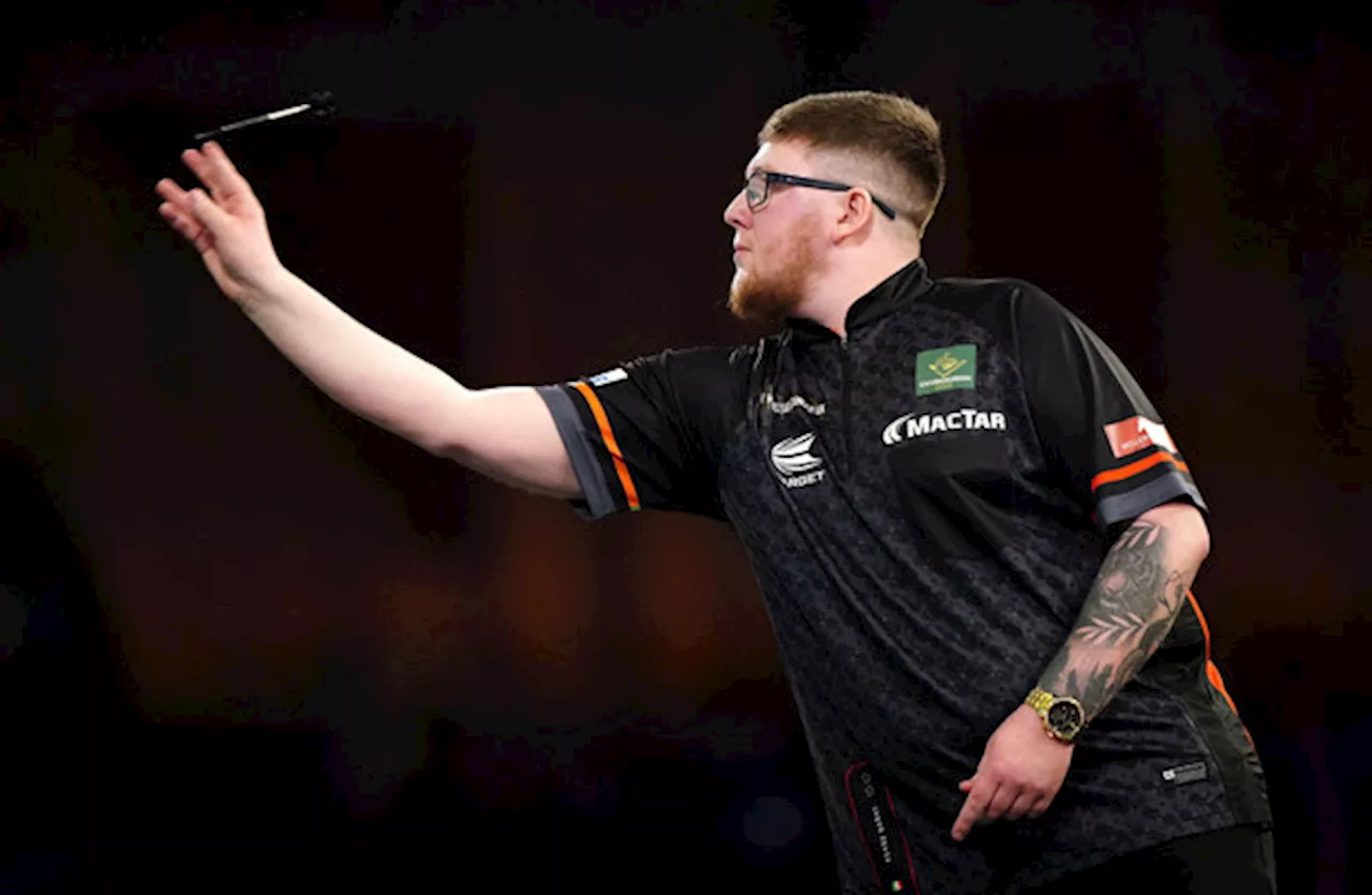 Luke Littler storms to six-minute whitewash of Keane Barry at Grand Slam of Darts