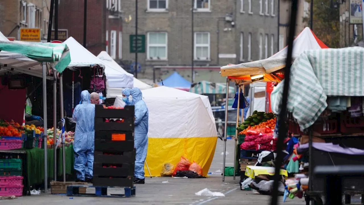 One killed and two injured after stabbing at south London market