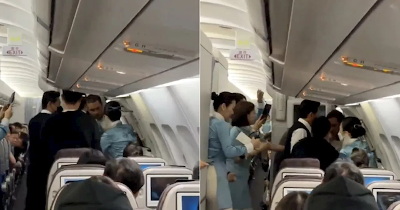 Video Shows Man Onboard Korean Jetliner Trying To Open Emergency Exit Mid-Flight