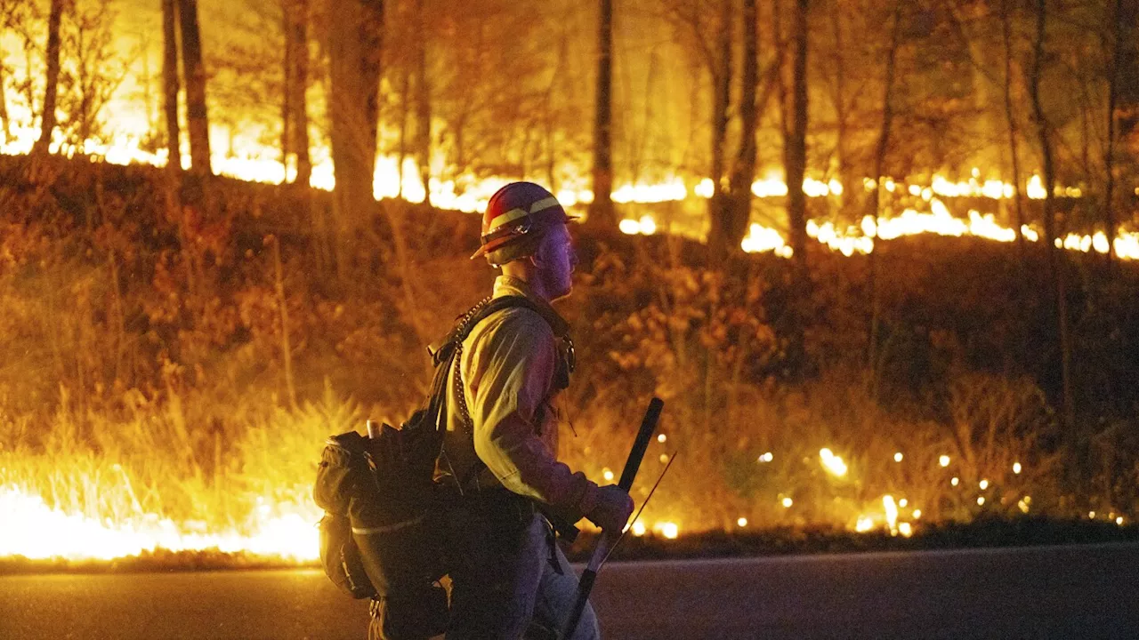 New wildfires burn in US Northeast while bigger blazes rage out West