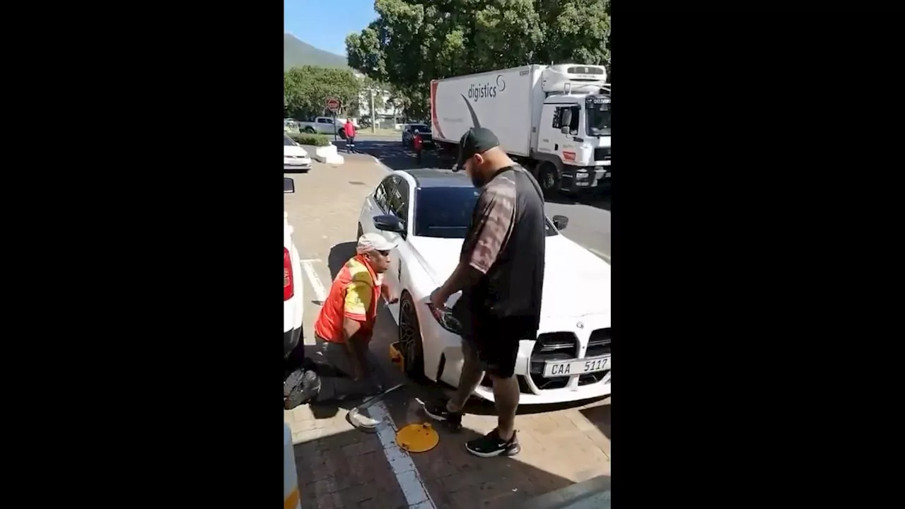 BMW driver apologises for verbally abusing petrol attendant