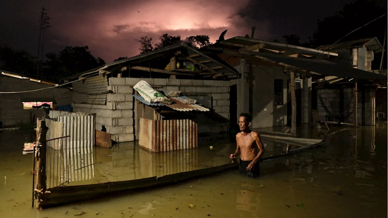 Typhoon batters storm-weary Philippines and displaces thousands more people as a new storm threatens