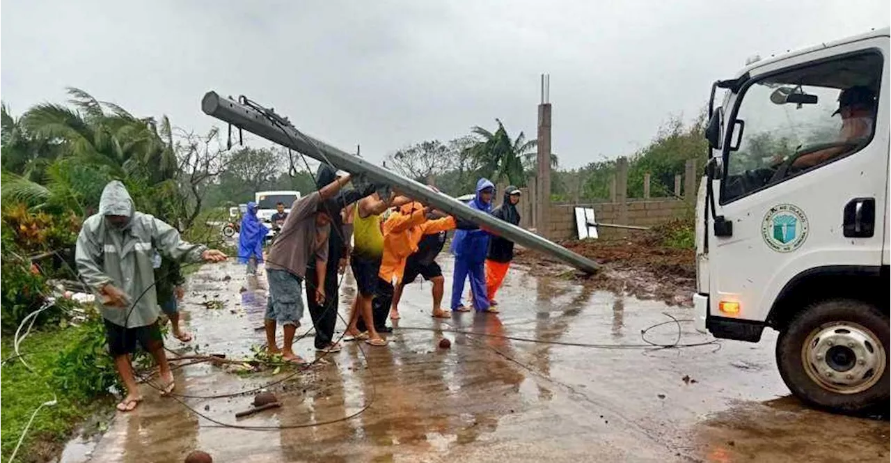 Thousands flee as fourth cyclone in a month hits Philippines