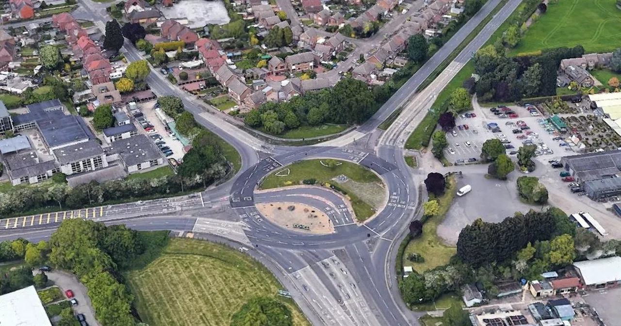 Two injured as police chase ends in crash at major roundabout on A52