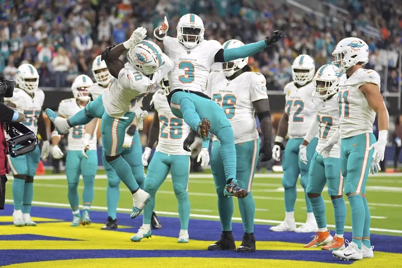 Hill scores key TD, Dolphins beat Rams 23-15 to snap 3-game skid