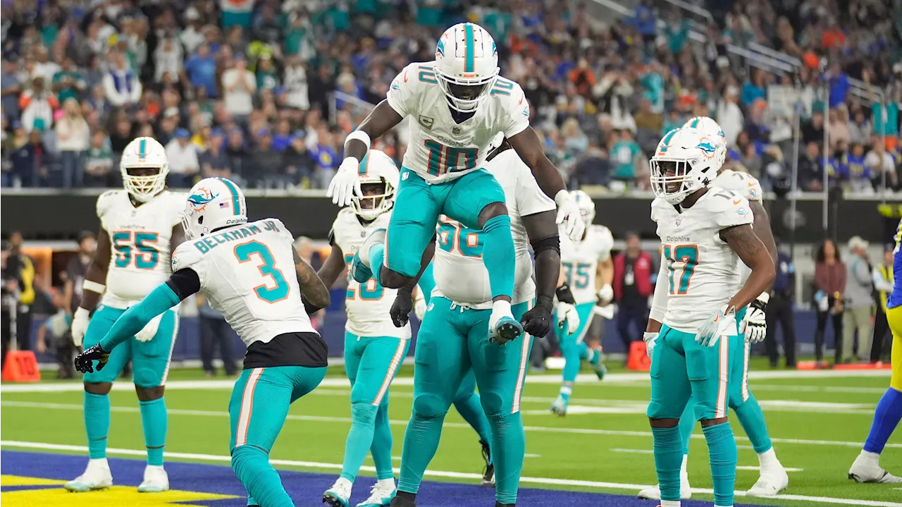 Hill's key TD catch helps Dolphins hold off Rams to snap three-game skid