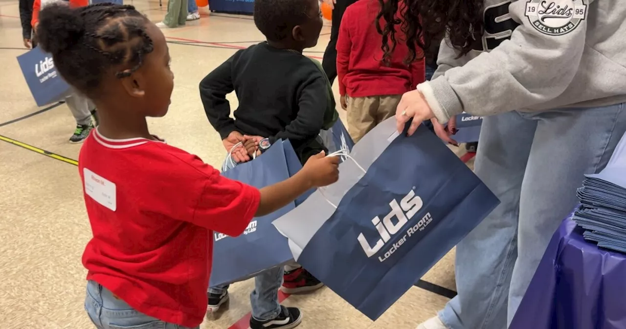 IPS students receive free shoes, hats from Colts’ Kenny Moore II