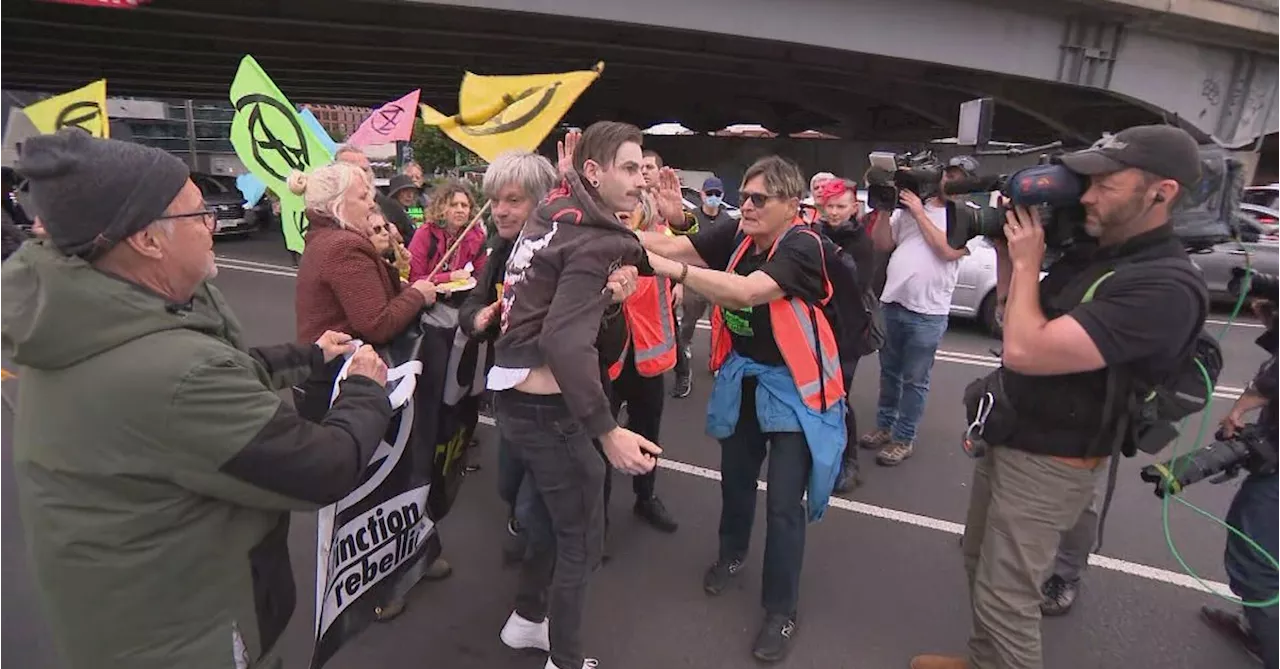 Extinction Rebellion climate activists block traffic on busy Melbourne road