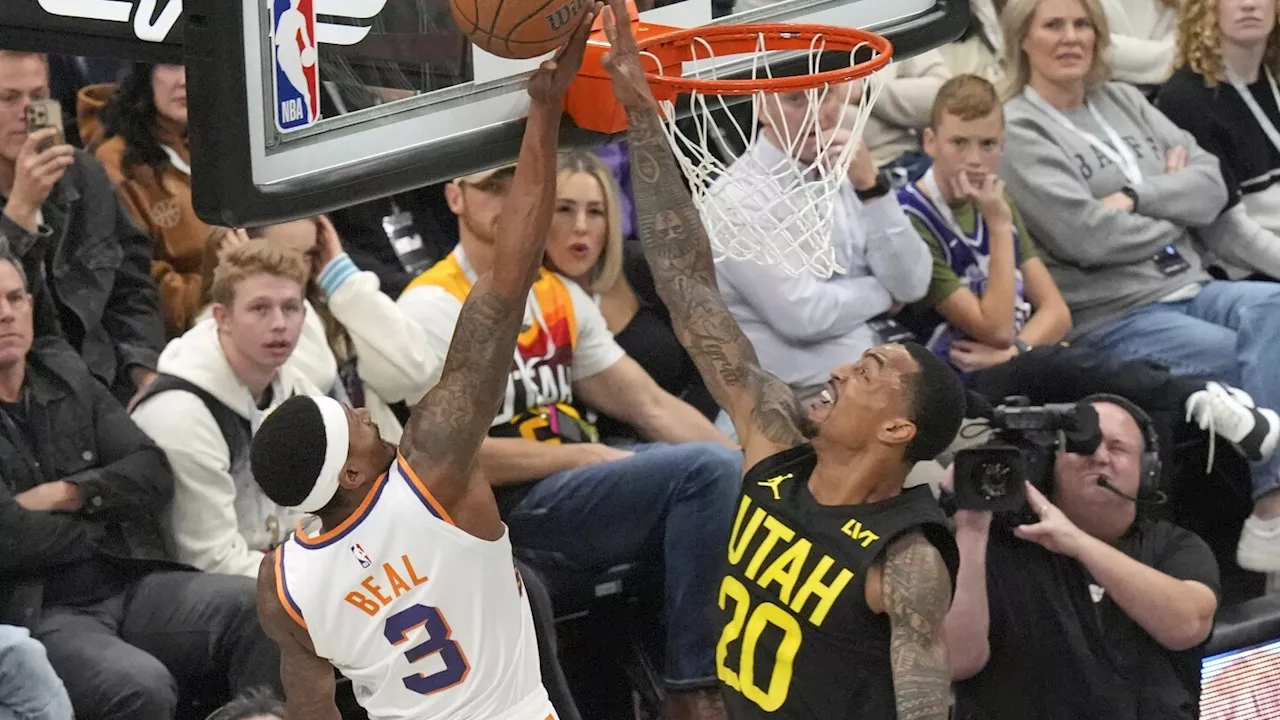 Booker scores 31, leads Suns to 120-112 victory over Jazz in the teams' NBA Cup opener