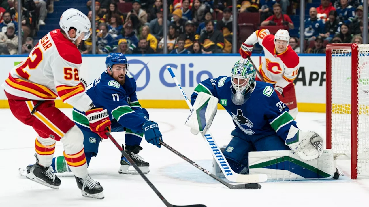 Pettersson and Brannstrom have a goal and assist each and Canucks top Flames 3-1