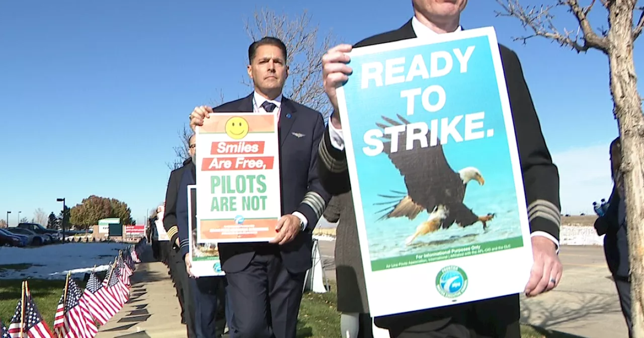 Frontier Airlines pilots picket outside of corporate office in Denver, say they are ready to strike