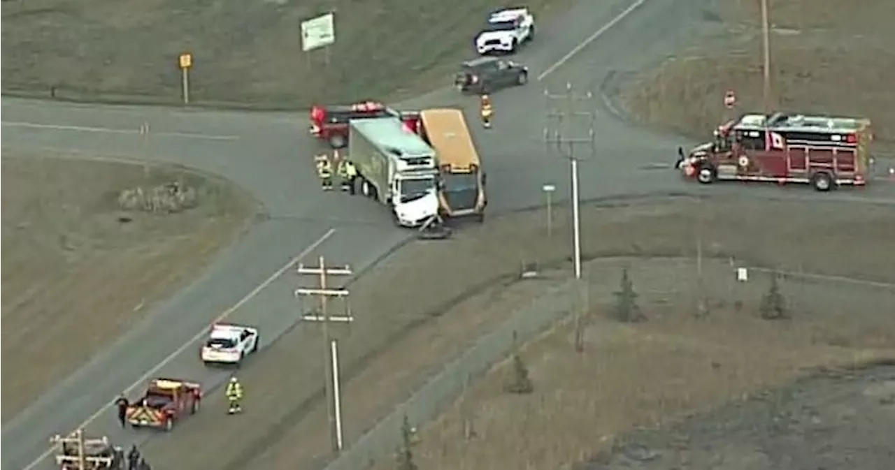 Cargo truck driver to be ticketed after school bus crash west of Edmonton