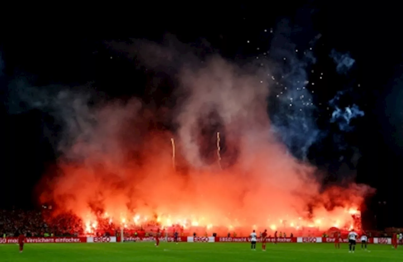 Bayern Munich fined after fans light up German Cup match with flares and fireworks