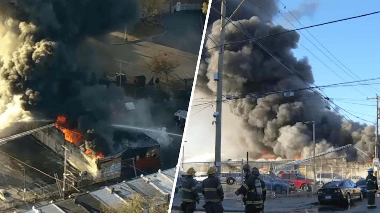 Live: Thick black smoke rises from Philadelphia warehouse inferno