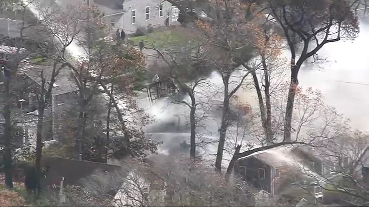 Firefighters rush to contain flames at Marshfield home before it causes brush fire