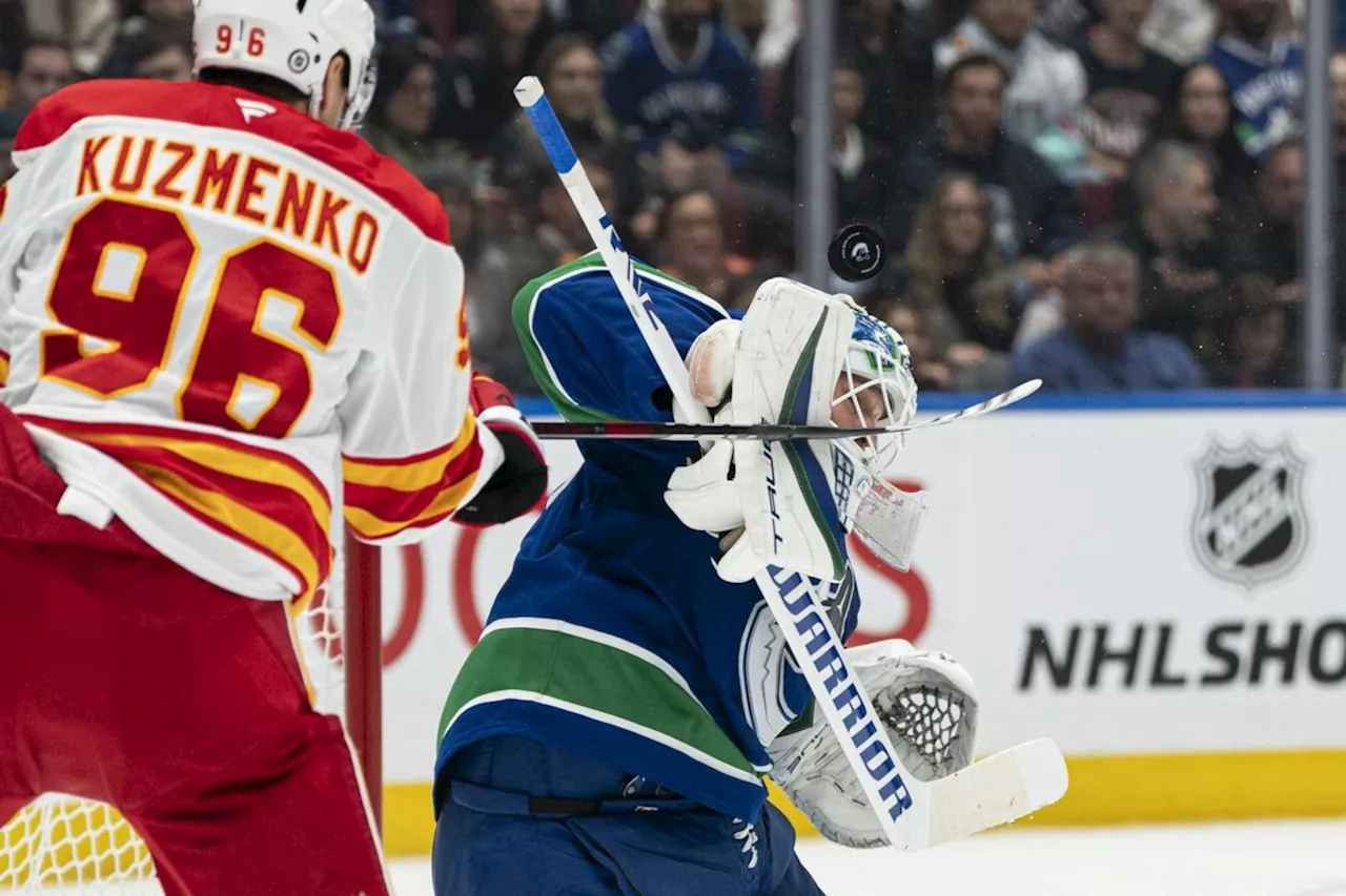 Canucks' Pettersson marks birthday with two points, 3-1 win over Flames