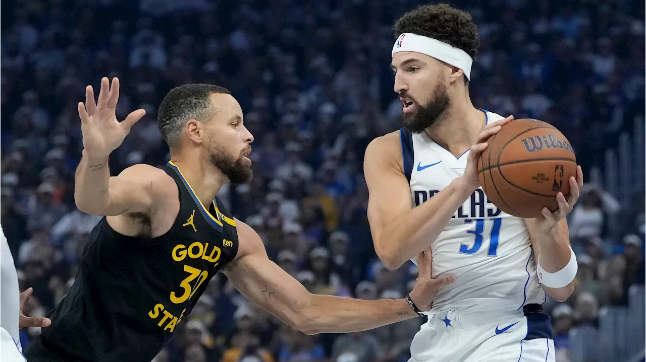 Curry steals the show in Thompson's emotional return as Warriors beat Mavericks