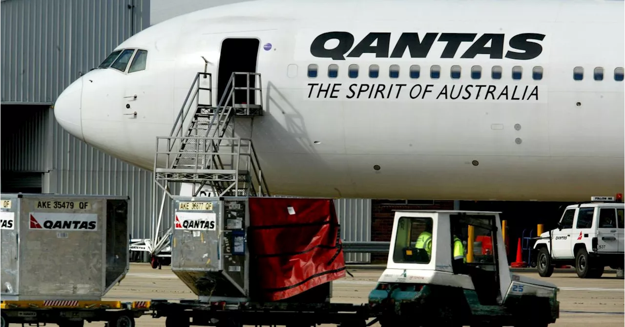 Woman and child hospitalised after turbulence on Qantas flight to Brisbane