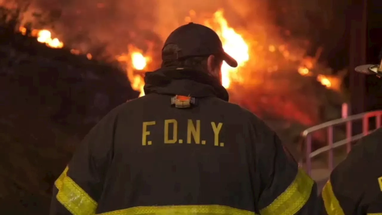 FDNY battles large brush fire, dangerous conditions, in Inwood Hill Park in Manhattan