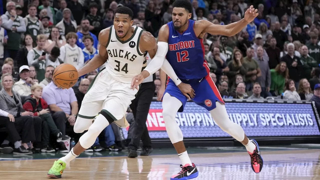 Antetokounmpo scores 59 and Bucks beat Pistons 127-120 in overtime