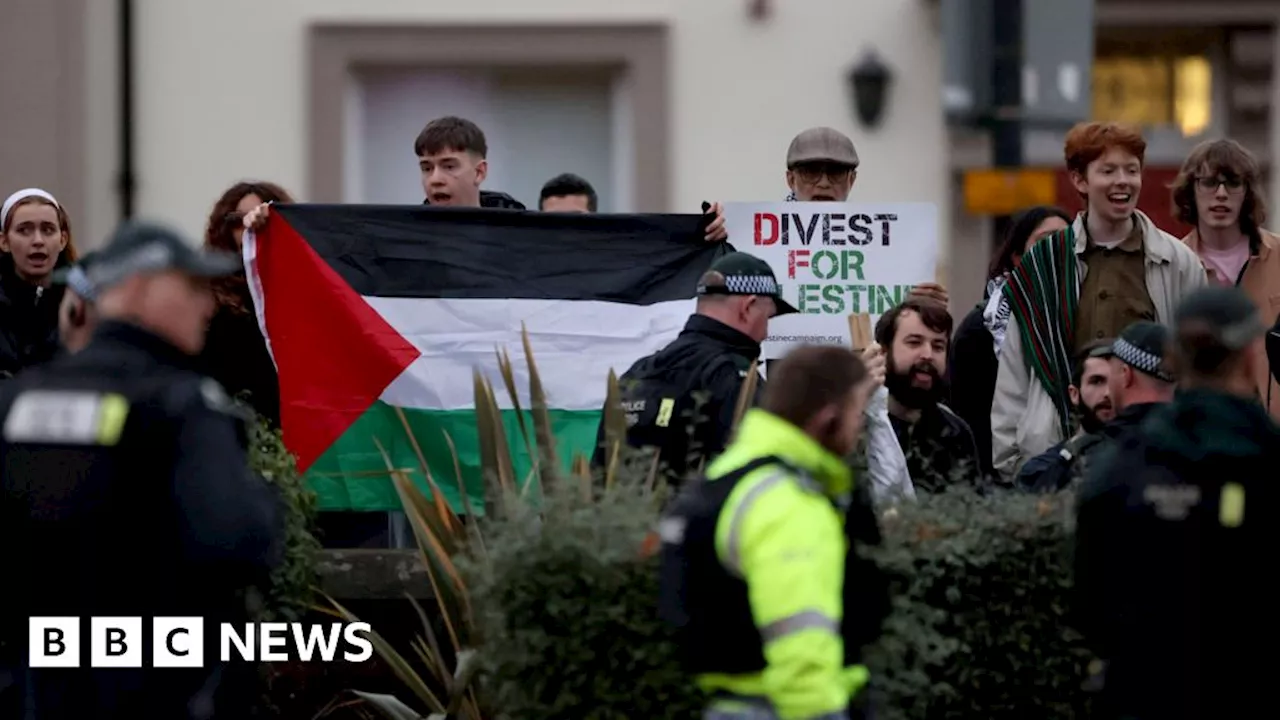 QUB: Four arrests at protest during Clinton visit