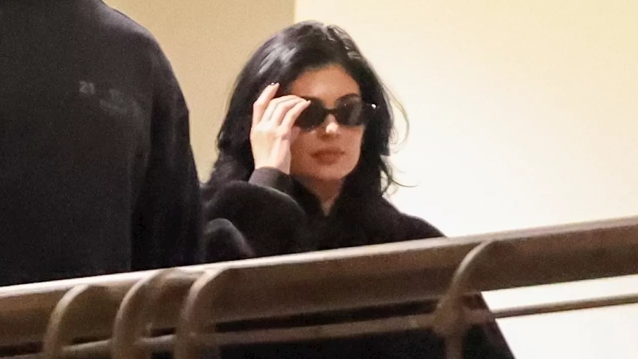 Kylie Jenner bundles up in a black outfit as she gets dinner with BFF Anastasia 'Stassie'...