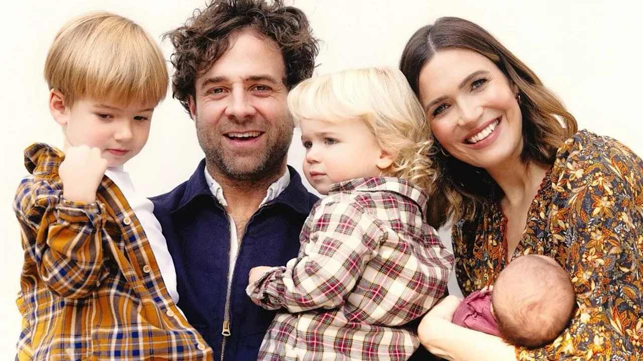 Mandy Moore cradles baby daughter Louise as she shares sweet holiday card with her newly expanded...