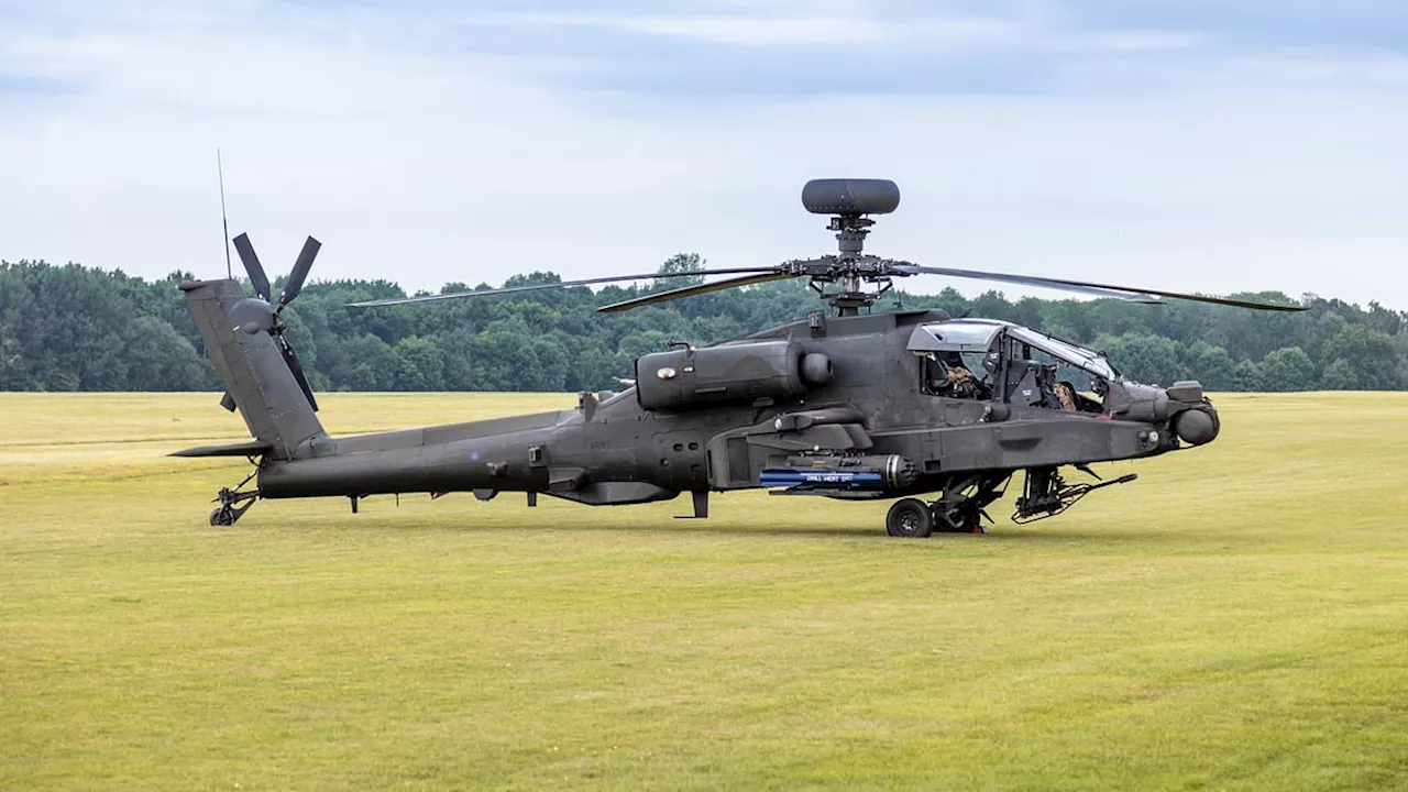 Boozed-up soldiers caught having sex in Apache helicopter: Drunken pair's cockpit romp sparks safety...