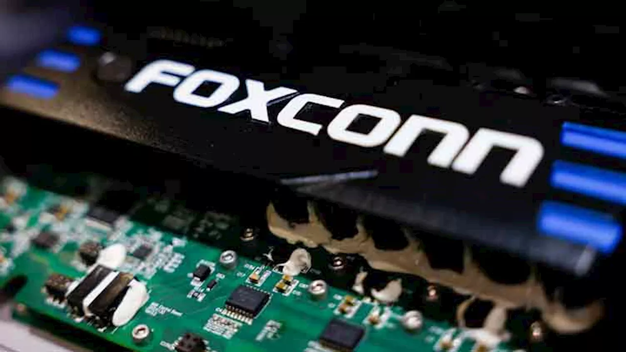 Foxconn sees robust AI server demand, delays EV target