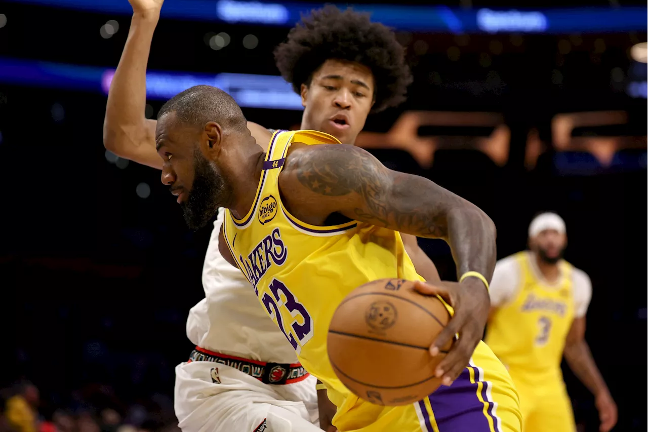 NBA: LeBron James' triple-double leads Lakers past Grizzlies