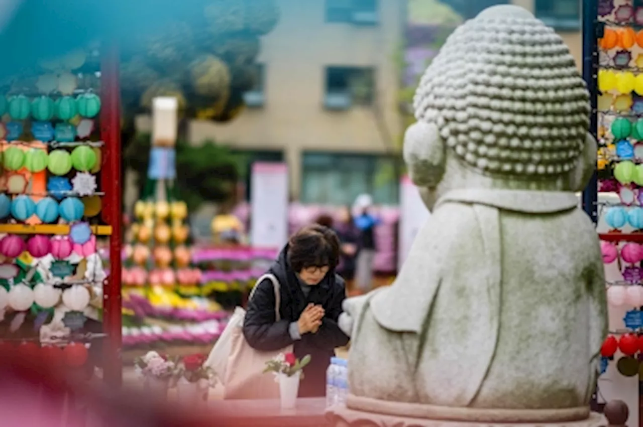 Exam-obsessed South Korean parents turn to live-streamed prayers for divine intervention