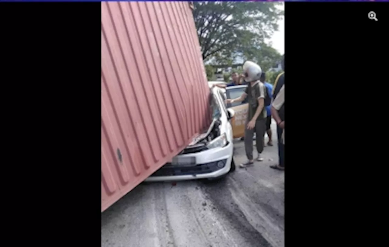 Penang trailer crash: Police arrest driver after container crushes car, killing woman