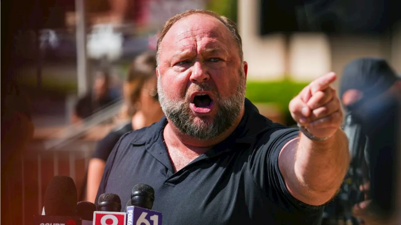 Satire publication The Onion buys Alex Jones’ Infowars at auction with Sandy Hook families’ backing