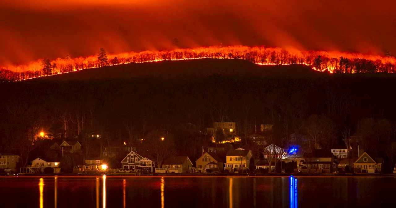 Parched fields and damaging blazes: The Northeast drought and wildfires in photos