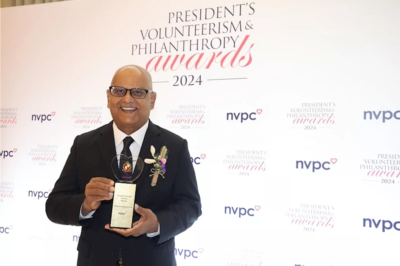 65-year-old cancer survivor gets award from President Tharman for supporting other patients