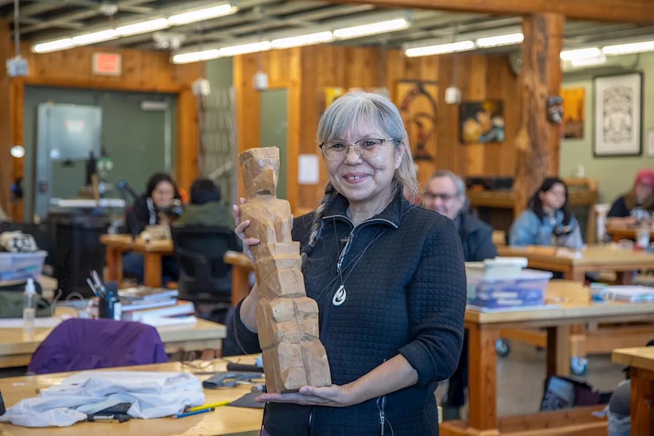 100-year-old model totem pole returns to its family