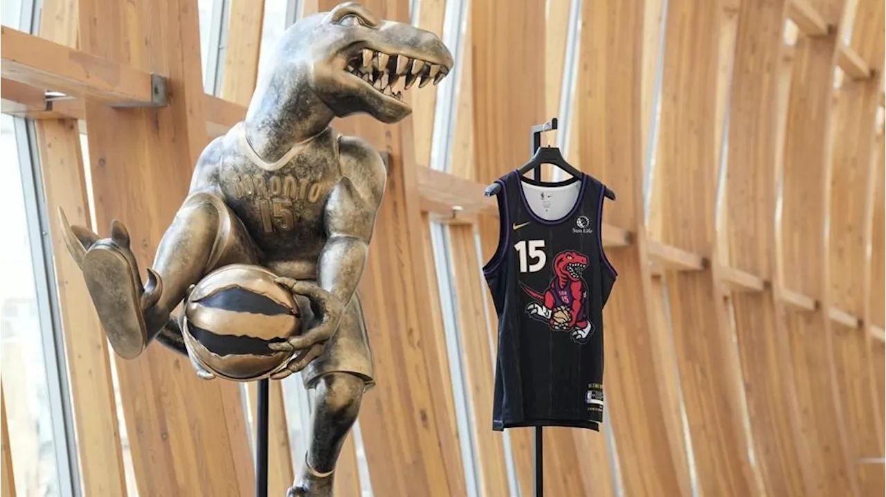 Raptors unveil Carter-themed alternate jersey with dunking dinosaur logo