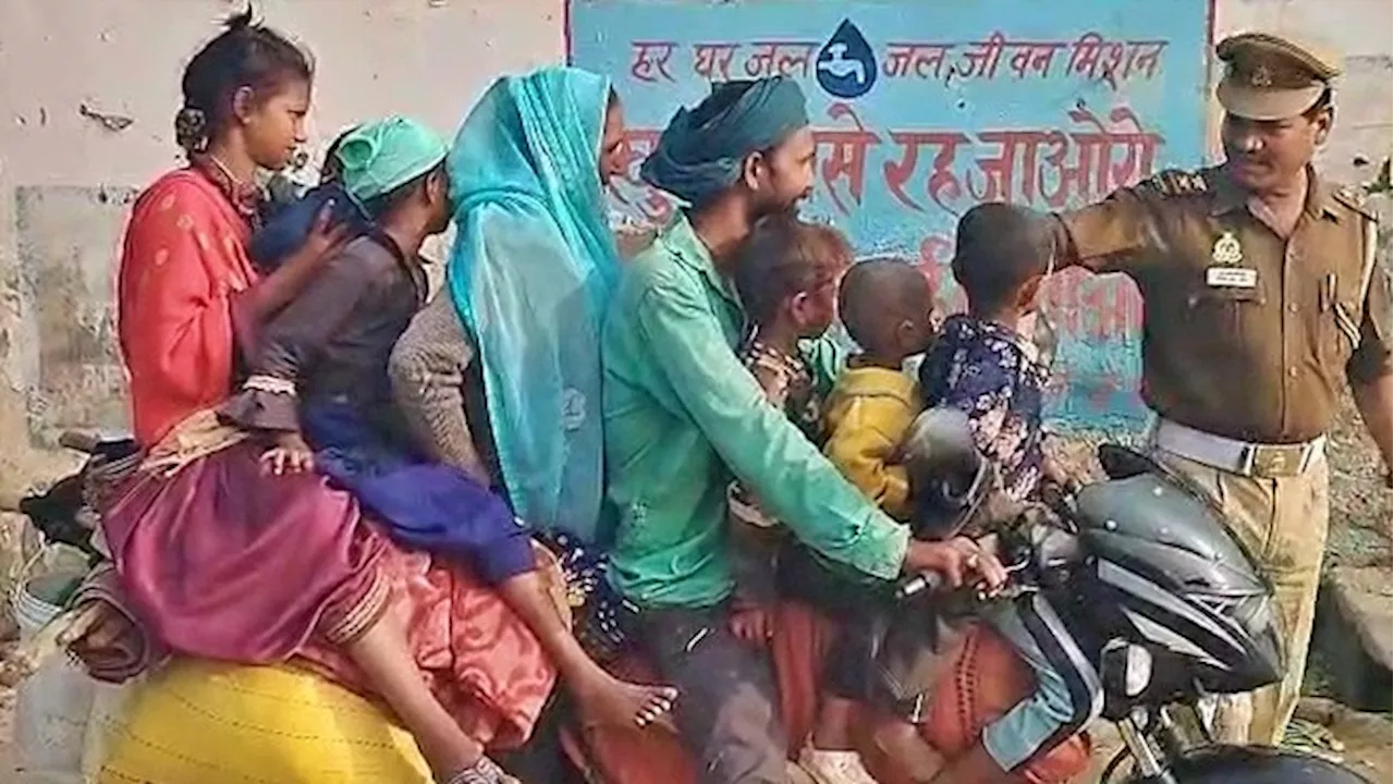 VIDEO: एक बाइक पर 8 लोग...साथ में रजाई, गद्दा और बाल्टी भी; ट्रैफिक पुलिस हैरान