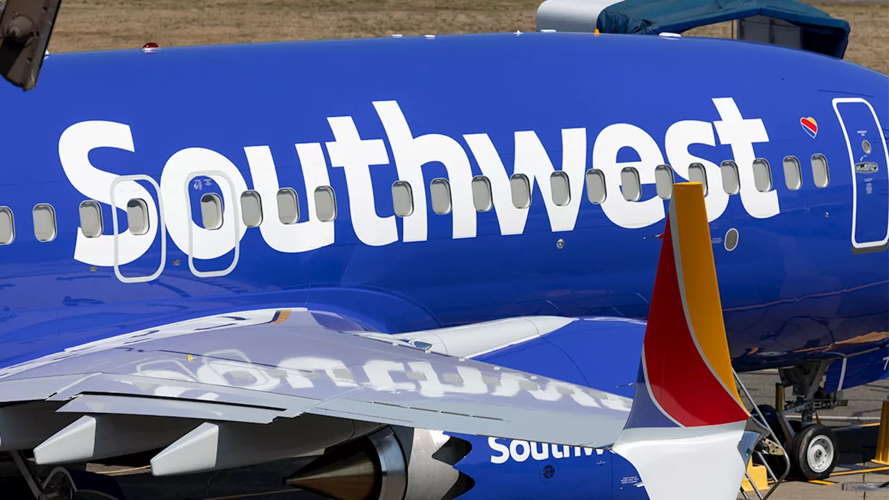 Houston-bound Southwest flight out of Denver delayed after phone catches fire; 2 people injured