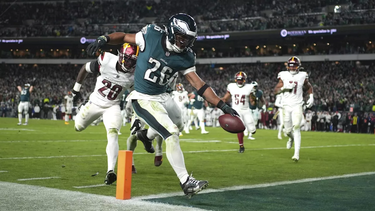 Saquon Barkley runs for 2 TDs, Eagles beat Commanders 26-18 to stretch NFC East lead