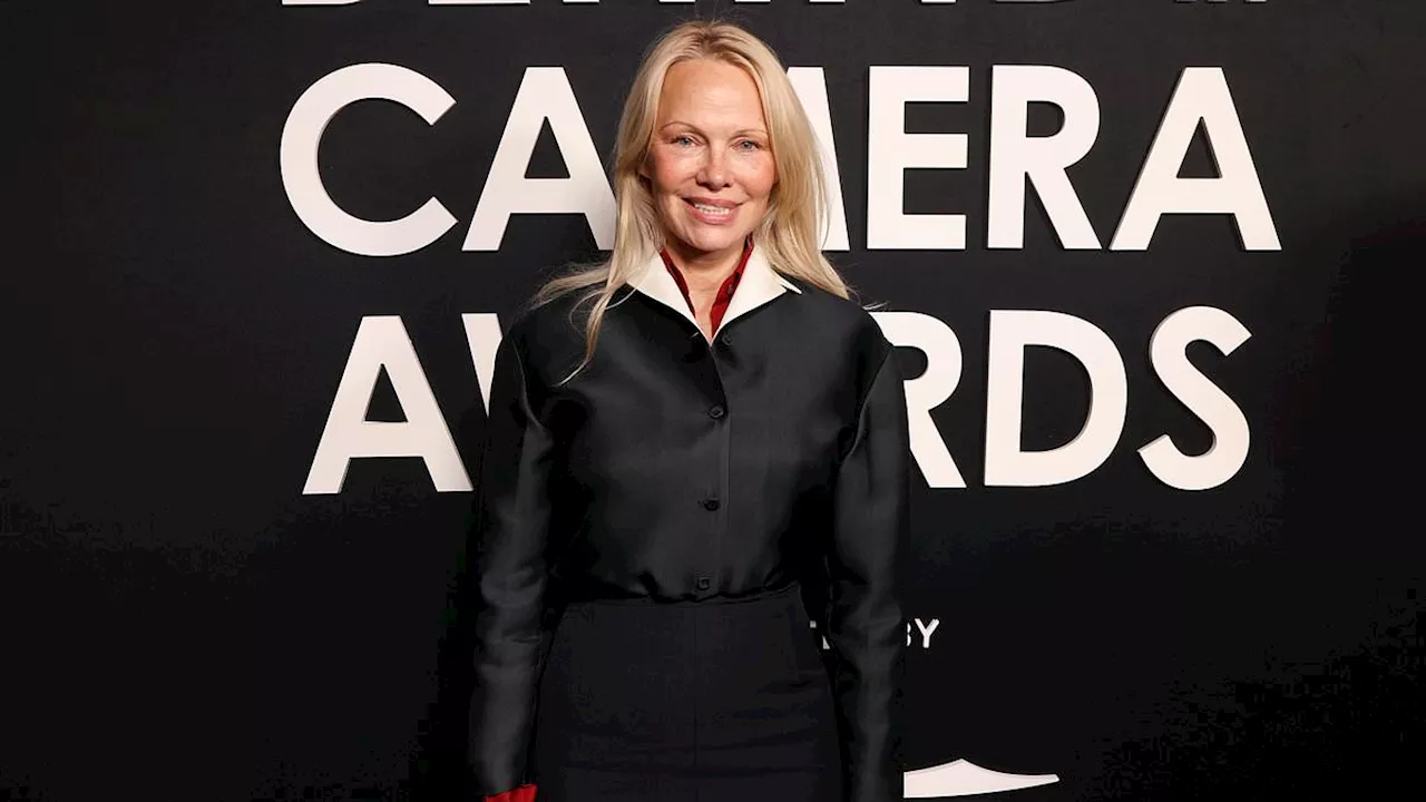 Pamela Anderson dons hip-hugging skirt to honor her Last Showgirl director