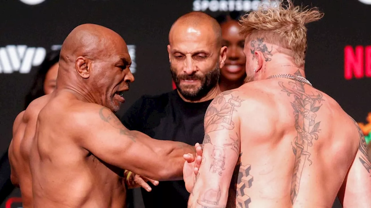 Watch: Mike Tyson slaps Jake Paul during staredown at weigh-in