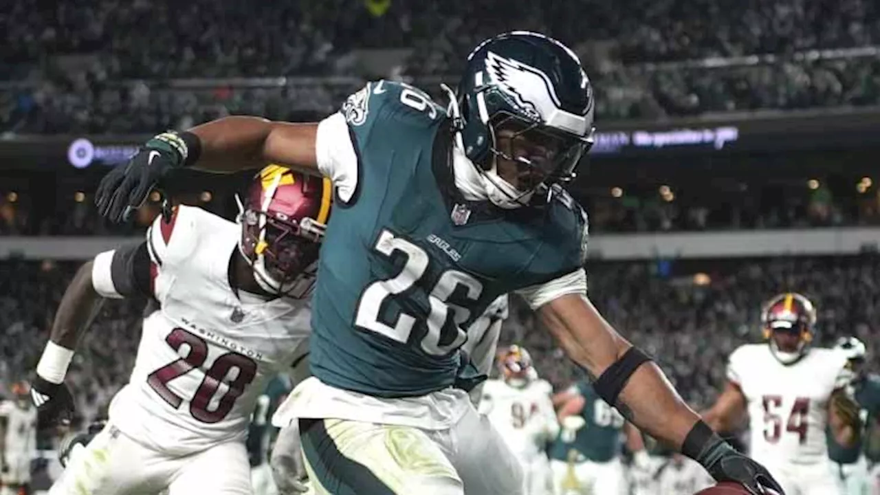 Saquon Barkley runs for 2 TDs, Eagles beat Commanders 26-18 to stretch NFC East lead