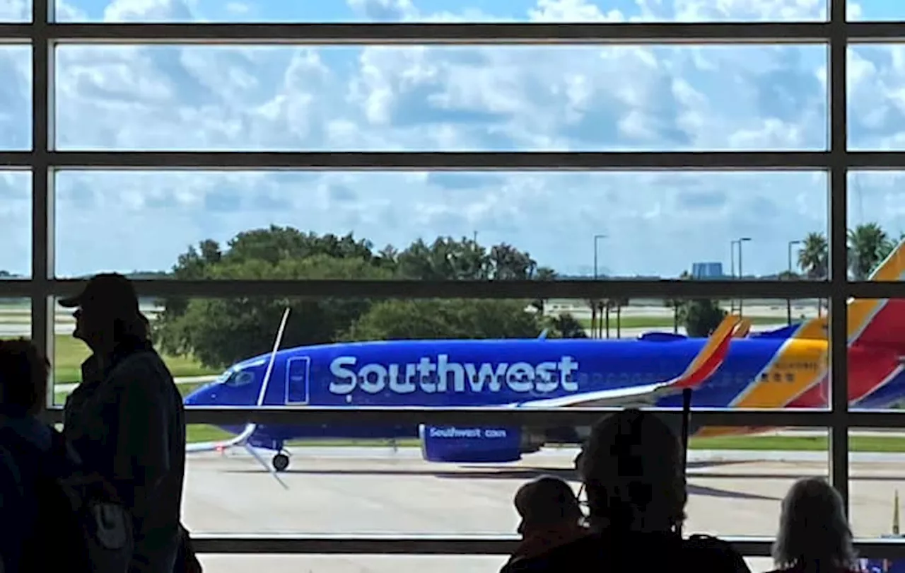 Southwest Airlines flight to Houston evacuated after cell phone fire, 2 injured