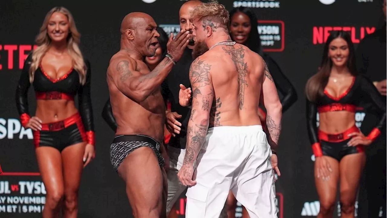 Mike Tyson slaps Jake Paul across face during weigh-ins ahead of fight night