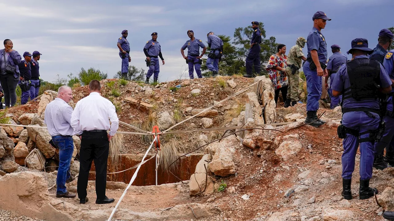 South African minister holds out olive branch to illegal miners in stand-off with police