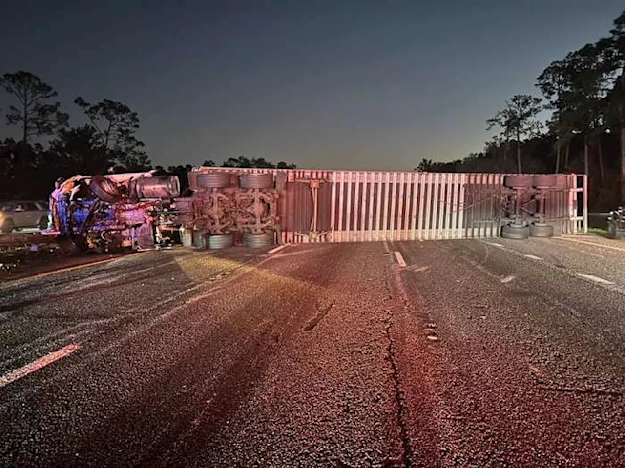 Semitruck carrying beer overturns, blocks all southbound lanes on I-95 in St. Johns County