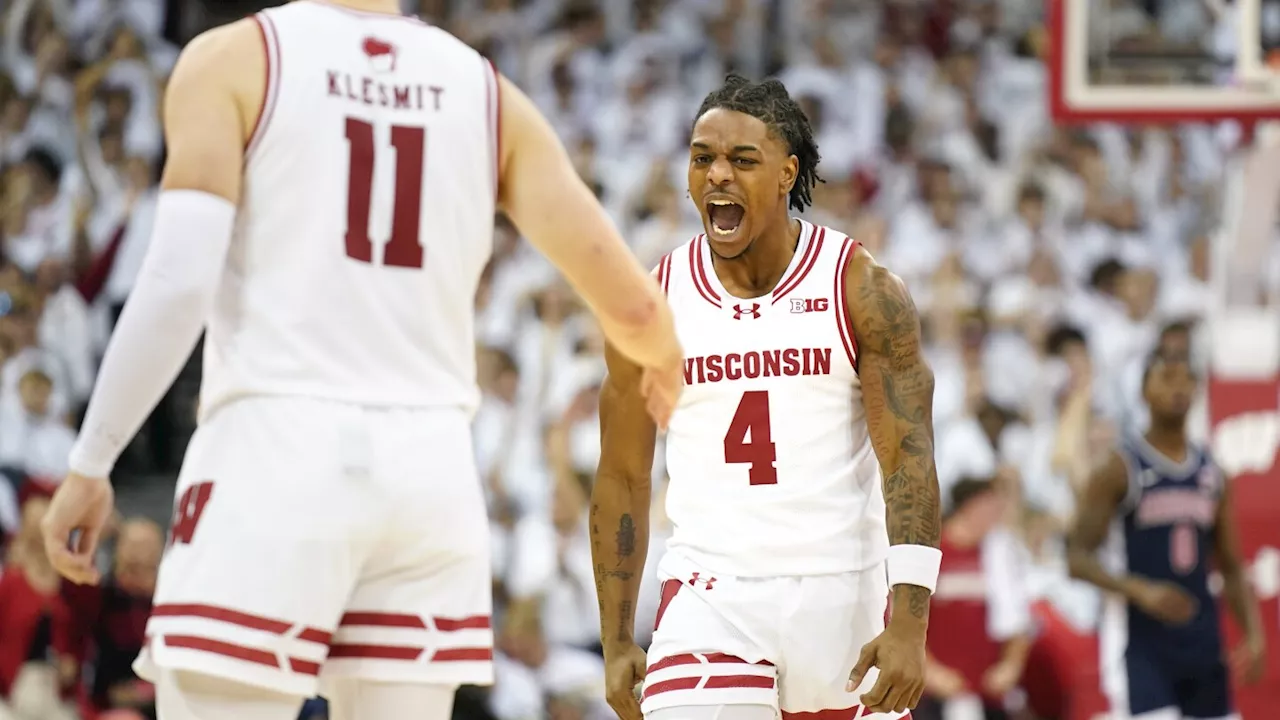 John Tonje scores 41 points as Wisconsin tops No. 9 Arizona 103-88 in foul-filled game